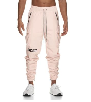 China 2022 new Anti-wrinkle fitness muscle shorts men sports running sweatpants pants tops elastic tight sports pants men for sale