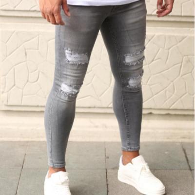 China 2021 breathable European and American men's jeans ripped new trend men's ankle feet jeans ripped elastic jeans for sale