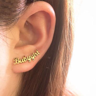 China Wholesale Hainon Stainless Steel CLASSIC babygirl letter earrings stud earrings fashion jewelry new for girls for sale