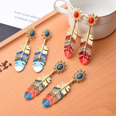 China FASHIONABLE Creative Alloy Gold Plated Bohemian Colorful Temperament Crystal Feather Dangle Earrings Easter Earrings For Women for sale