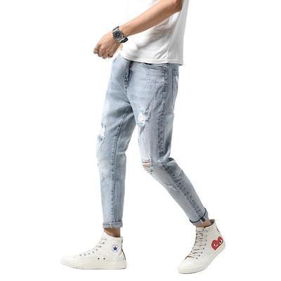 China Casual ripped Korean version of the four seasons fashion breathable new men's jeans trend small nine-cent stretch leg slim pants for sale