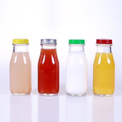 China 1L PET plastic round disposable custom hot filling juice bottle for sale