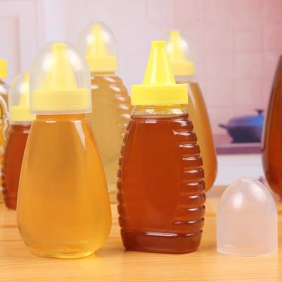 China manufacture plastic syrup dispenser honey packaging jar for sale