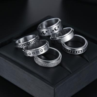 China Hiphop Amazon Supply Rotating Titanium Steel Star Moon Decompression Ring For Women Men for sale