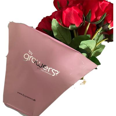 China Fresh Flower Packaging Cheap Flower Wrapping Paper Flower Pot Sleeve Fresh Flower Printed Plastic Sleeve for sale