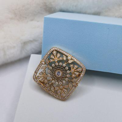 China Real ZIRCON Brass Brooches Diamond Brooch Hollow Insert Nail 24K Gold Plating Prong Pins for sale