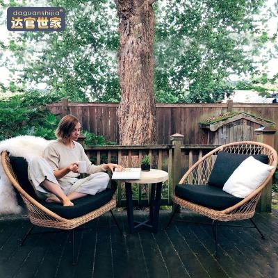 China Durable outdoor sofa yard villa balcony rattan chair tea table combination waterproof bask in rattan woven leisure for sale