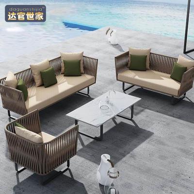 China Modern outdoor waterproof balcony living room outdoor waterproof balcony tea table rattan furniture homestay rattan chair for sale