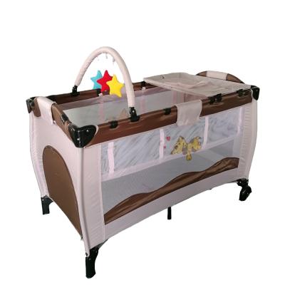 China Modern Luxurious Cloth Art Is Mixed Universal Collapsible Hutch Play Crib Diaper Table Double Deck Travel Crib for sale