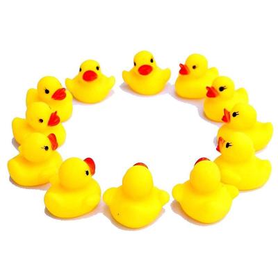 China Bath Toy Custom Logo 2inch Yellow Mini Floating Rubber Duck Bath Toys for sale