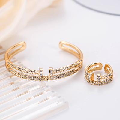 China FASHIONABLE Gold Plated Luxury CZ Stud Bangle Bracelets Set For Women Slap Bracelet And Ring for sale