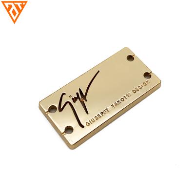 China Custom Fashion Washable Gold Brand Letters Sew Hang Label Metal Tag For Clothes for sale