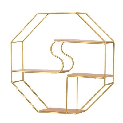 China Lightweight Luxury Octagonal Shape Golden Wall Shelf Viable For Home Wall Display Shelves for sale