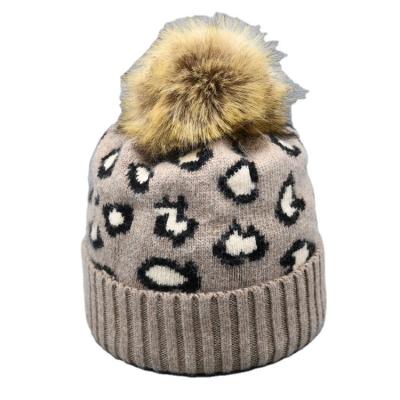 China Raccoon Detachable Pom Hat Winter Women Custom Pom Pom Knit Hat From Factory Wholesale COMMON Pattern Leopard for sale