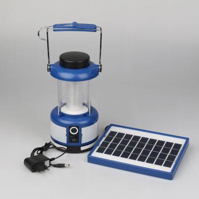 China Emergency Residential Rechargeable Handle Universal Portable Camping Led Solar Light with FM Radio and Cell Phone Charger for sale