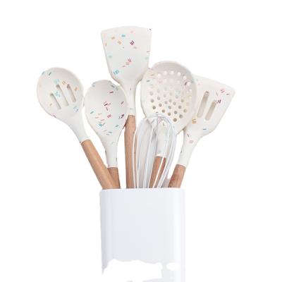 China 13 Pieces Silicone Dot Sustainable Popular Kitchenware with Wooden Handle, Cooking Spoon, Spatula and Storage Bucket for sale