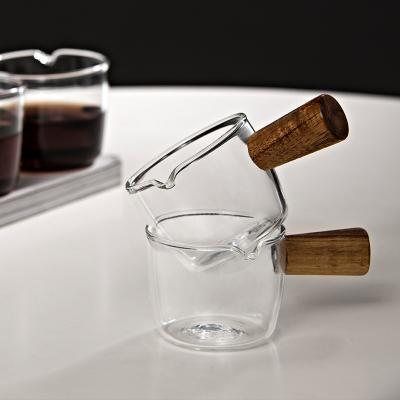 China Easy Operation Heat Resistant Glass Honey Handle Milk Cup Mini Wooden Espresso Extraction Mug for sale