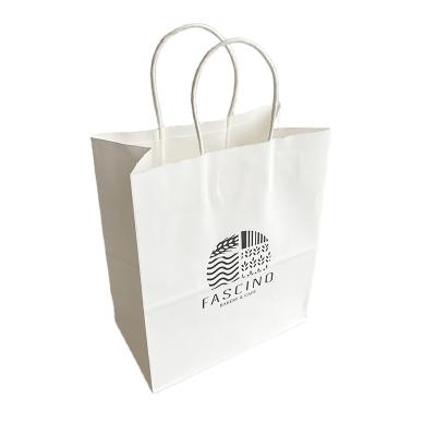 China Cheap Disposable Plain Paper Kraft Paper Suit Wedding Gift Bags Personal Wedding Shopping Bags With Logo Customized for sale