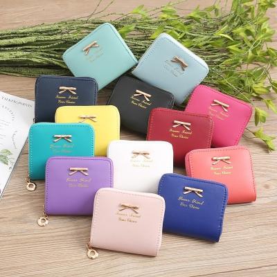 China Waterproof Pu Leather Women's Bow Coin Wallet Small Zipper Card Purse Ladies Clutch Purse for sale