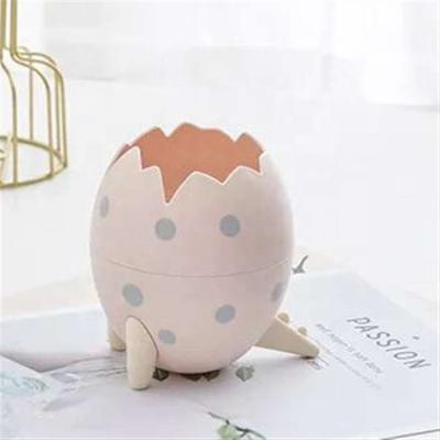 China Multifunctional Sustainable Desktop Storage Organizer Matching Bin Cartoon Dinosaur Egg Waste Basket for sale