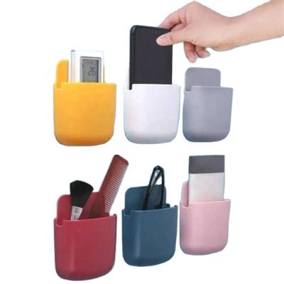 China Viable Plastic Mobile Phone Remote Control Wall Mounted Holder Bedside Storage Box Remote Control Storage Box for sale