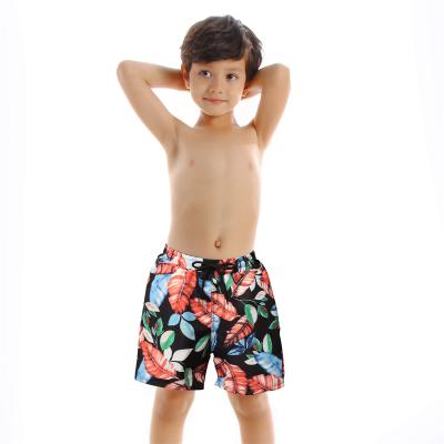 China Wholesale Cheap Breathable Summer Cartoon Kids Boy Swimwear Beach Wear Trunks Beach Shorts With Leaf Print for sale