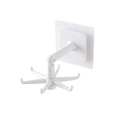 China 360 Degree Rotation True No Dead Space Foldable Hanger Bathroom Storage 360 ​​Degree Sticker Holder for sale