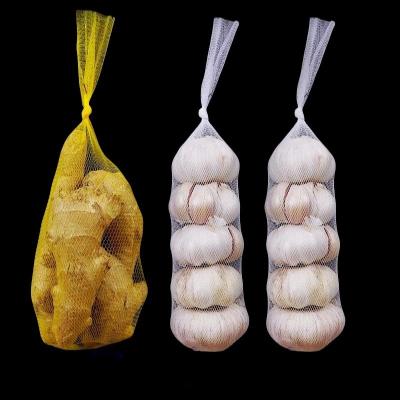 China Customizable Supermarket Packaging Plastic Net Bag for Ginger Garlic Vegetable and Fruit for sale