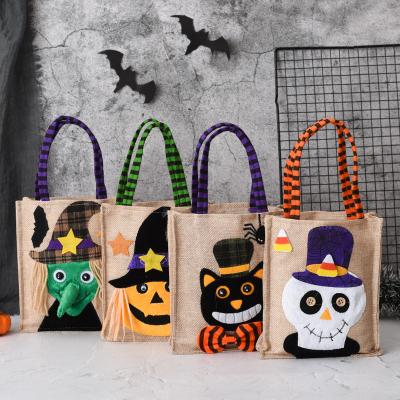 China Embossing Halloween Candy Bag for Small Gifts 26*15cm Linen Handbag Witch Pumpkin Theme for sale