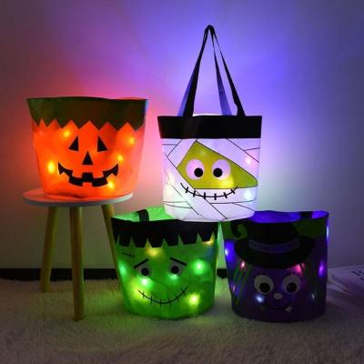 China Grande saco de doces de Halloween com luzes intermitentes e cor personalizada em material de algodão à venda