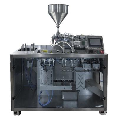 China Paper Packaging Metering Filling Sealing Device 2.5CBM Grass Packing Machine Power 1.4KW for sale