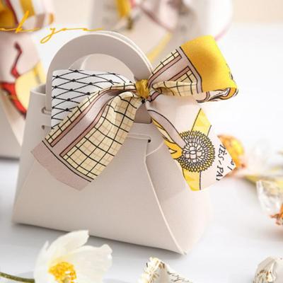 China Hold Sweets Wedding Bags Accessories Cute Gift Box PU Candy Handbag Elegant Leather Tote Bags for sale