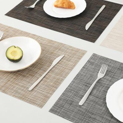 China Durable Eco Friendly Heat Insulation Table Non-slip Mat Woven PU Western Place Mats for sale