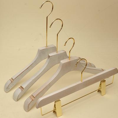 China Durable Customized Luxury Wooden Commercial Hotel Suit Coat Stand White Gold Hook Hanger For Clothes for sale