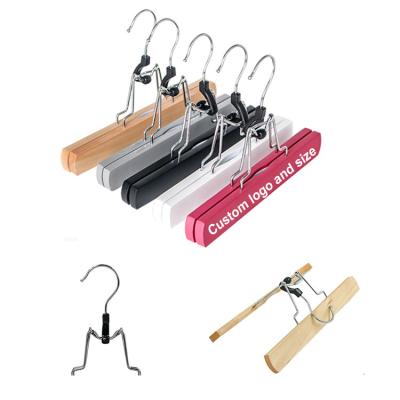 China 2021 Amazon Multifunctional Bestselling Skirt Hair Hangers Wooden Hair Extensions Hair Hanger With Customized Color for sale