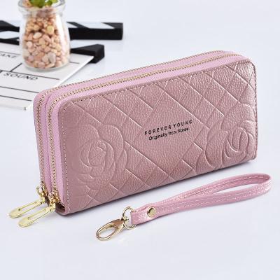 China 2022 new waterproof simple ladies pinch wallets for fashionable women's long wrist bag large capacity zipper mobile phone bag double for sale