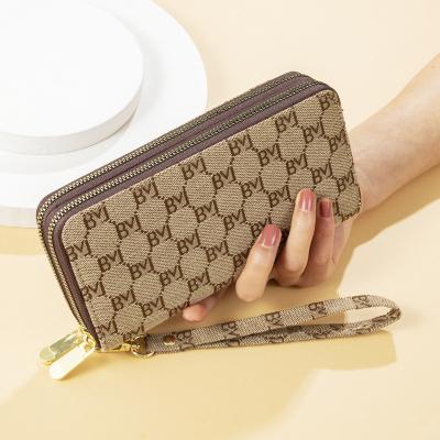 China Waterproof 2022 New Arrival Long Wallet Women Grab Purse Double Zipper Fashion Luxury Designer Money Bag for sale