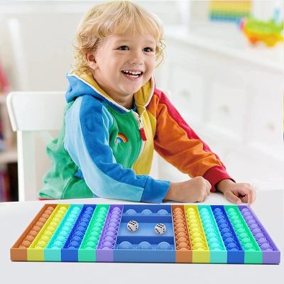 China Big Safety Noises Game Stirring Person Toy, Rainbow Chessboard Push Bubbles Snap Stir Sensory Toys For Parent-child Time for sale