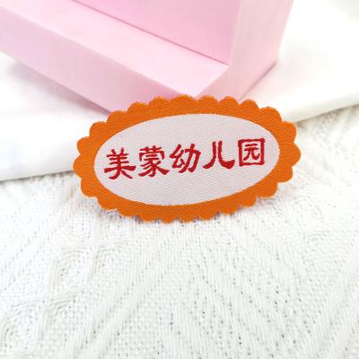 China Custom Wholesale Cheap Fabric Fashion Woven Embroidered Badges For School Clothes for sale