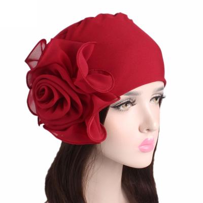 China Fashion/casual ladies/new style comfort/trend side big flower turban hat elegant fashion stretchy chemotherapy hat for sale