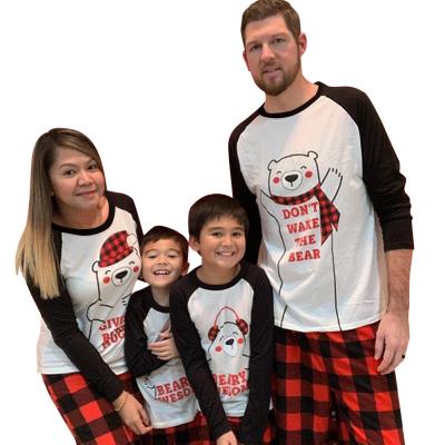 China Breathable Comfortable and Casual Homewear Pajamas Set Long Sleeve Cartoon Printing Christmas Parent and Child Pajamas for sale