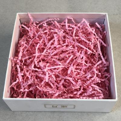 China ANTISTATIC Pink And Hot Pink Color Fold Shred Paper With Good Quality for sale