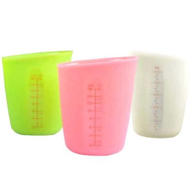 China New Eco Friendly Amazon Kitchen Sustainable Cooking Pour Cup Silicone Baking Measuring Cups for sale