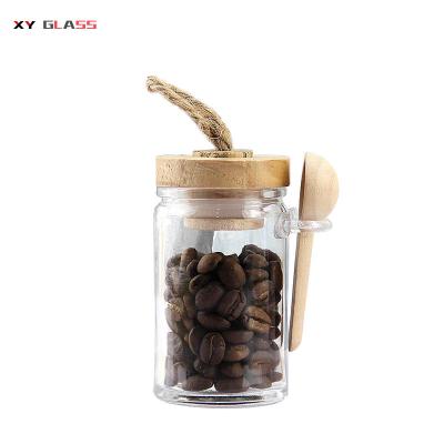 China New Design Product Microwavable Spice Storage With Pyrex Wooden Spice Spoon Glass Jar for sale