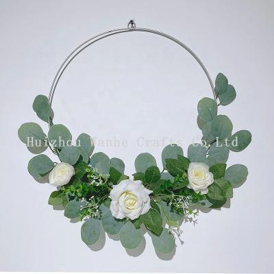 China Cheap Artificial Metal Circle Wreath Fake Greenery Pink Eucalyptus Leaves Garland for Party Home Indoor Decor for sale