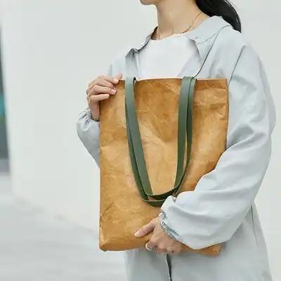 China Brown Tyvek Paper Washable Tote Bags Sustainable Bio Degradable With Leather Handle Strap en venta