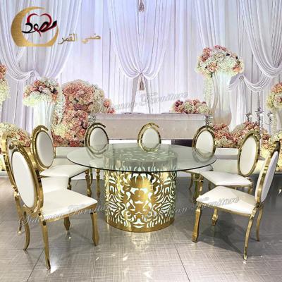 China Round glass top stainless steel dinning table light led party table for sale