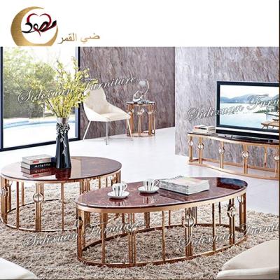 China Luxury modern furniture Oval rose gold metal stainless steel base coffee table set à venda