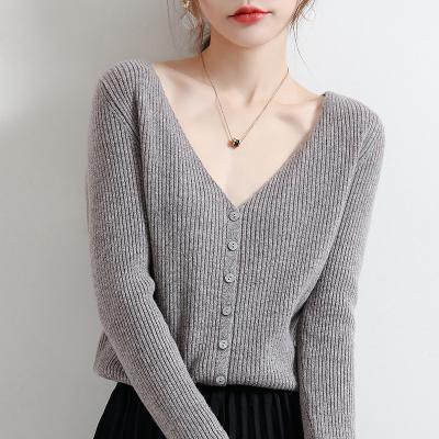 China Anti-wrinkle pure wool knitted lazy wind V-neck top of the new color matching 2021 women's cardigan spring coat the sweater for sale