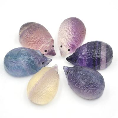 China Hot Bulk China Crystal Craving Rainbow Fluorite Hedgehog Hand Carved Crystal Animal Carvings for sale